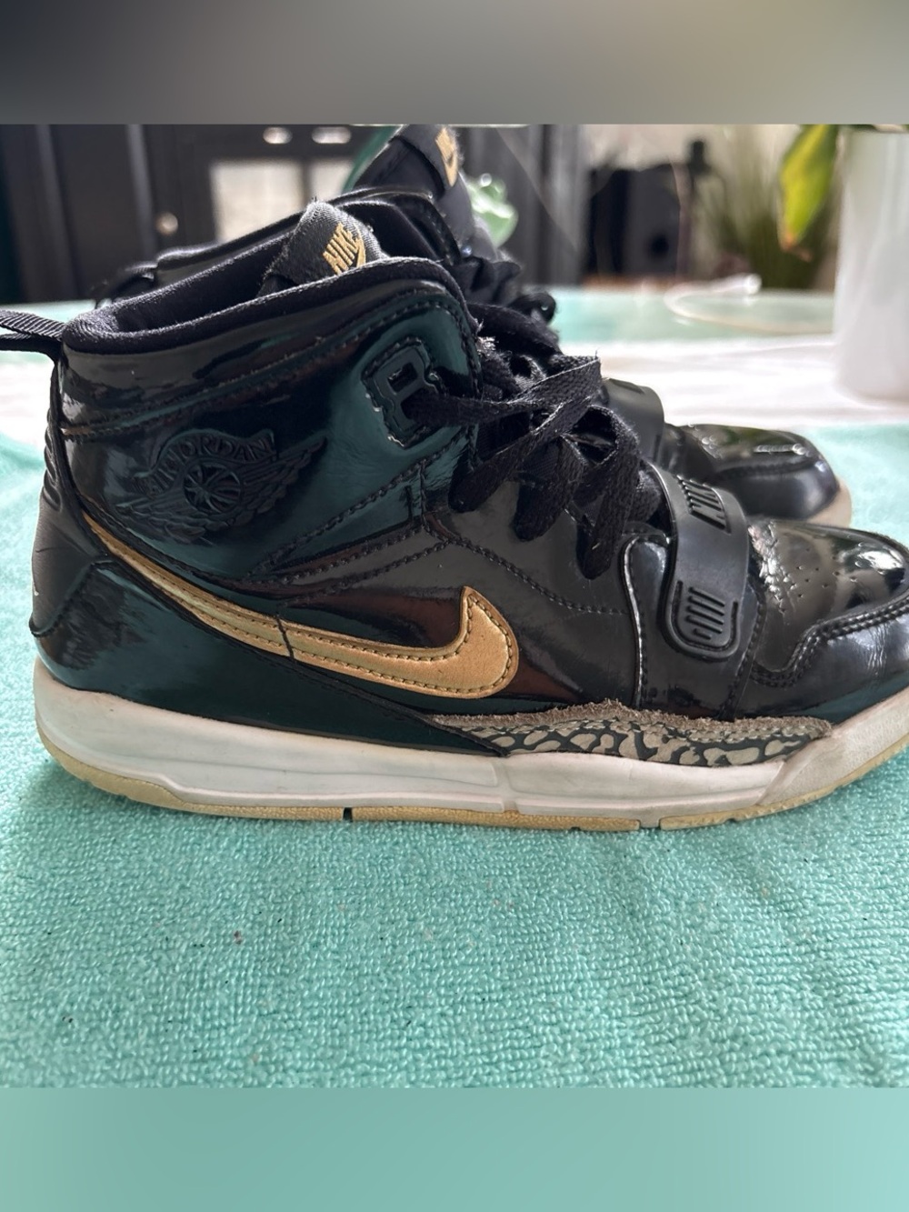 Nike Kids' High-Top Sneaker - Black with Gold Swoosh